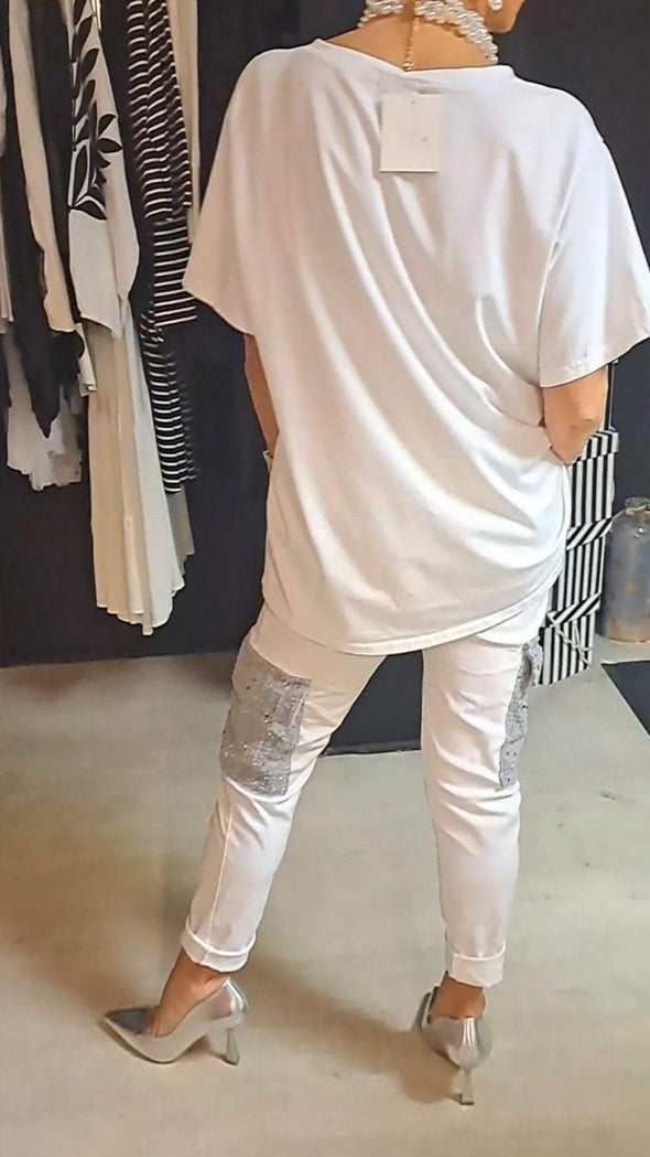 Casual tweedelig pak met ronde hals en top met glinsterende broek